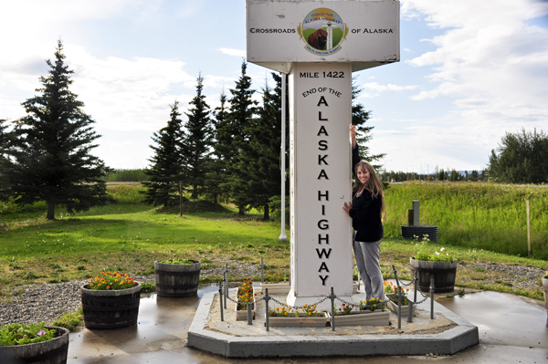 Karen Duquette at the milepost marker 1422 in 2016